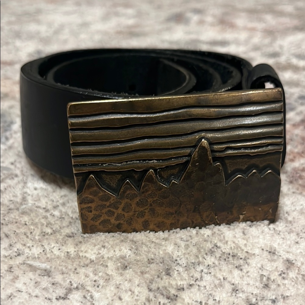 Black belt with mountain buckle